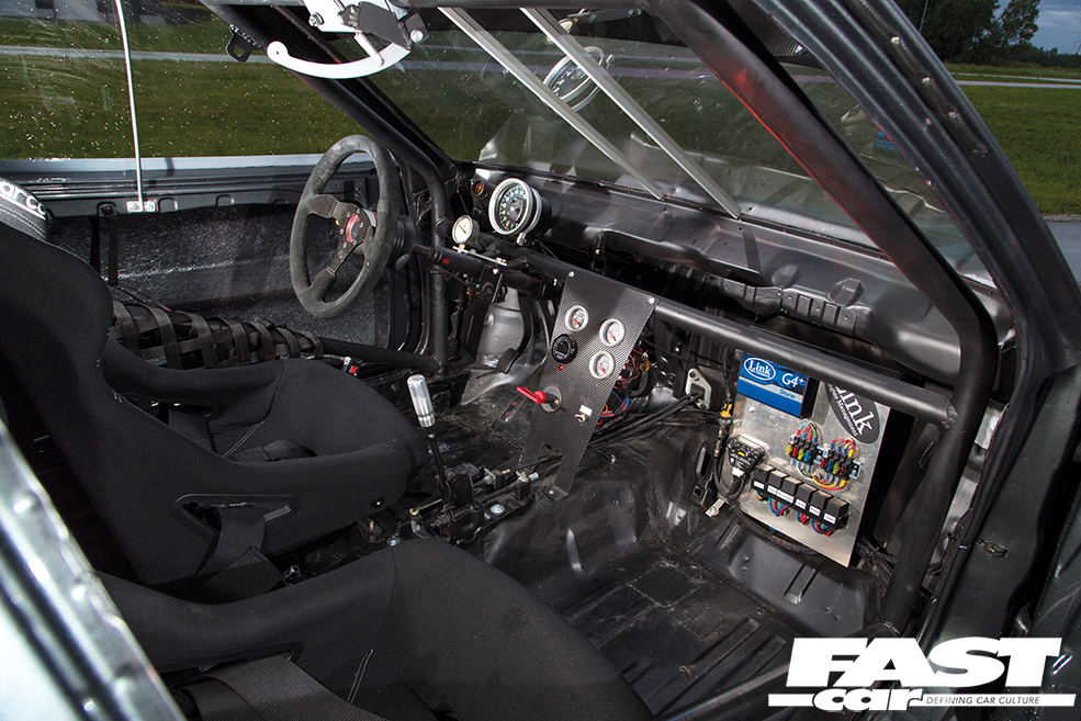 A stripped-out car interior.