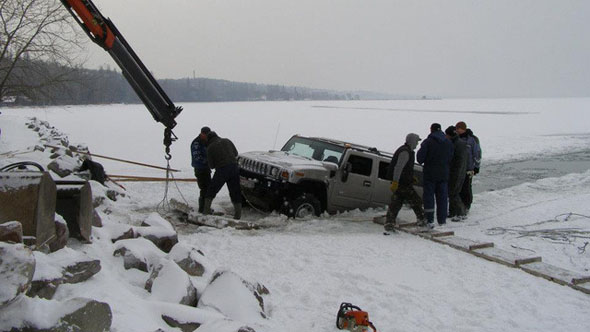 Hummers fall through ice 